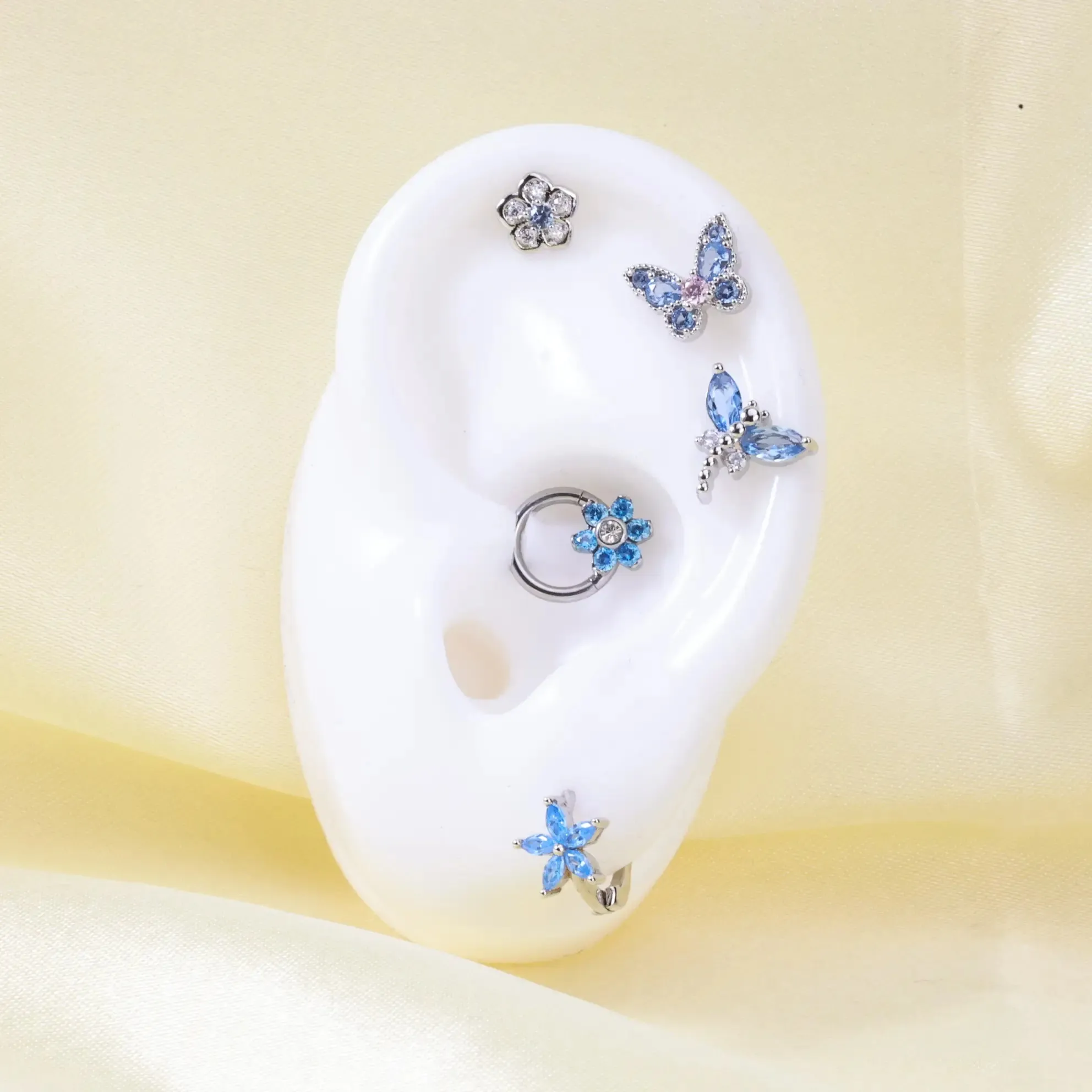 AQUAMARINE LIGHT BLUE FLOWER SMALL HOOP EARRING