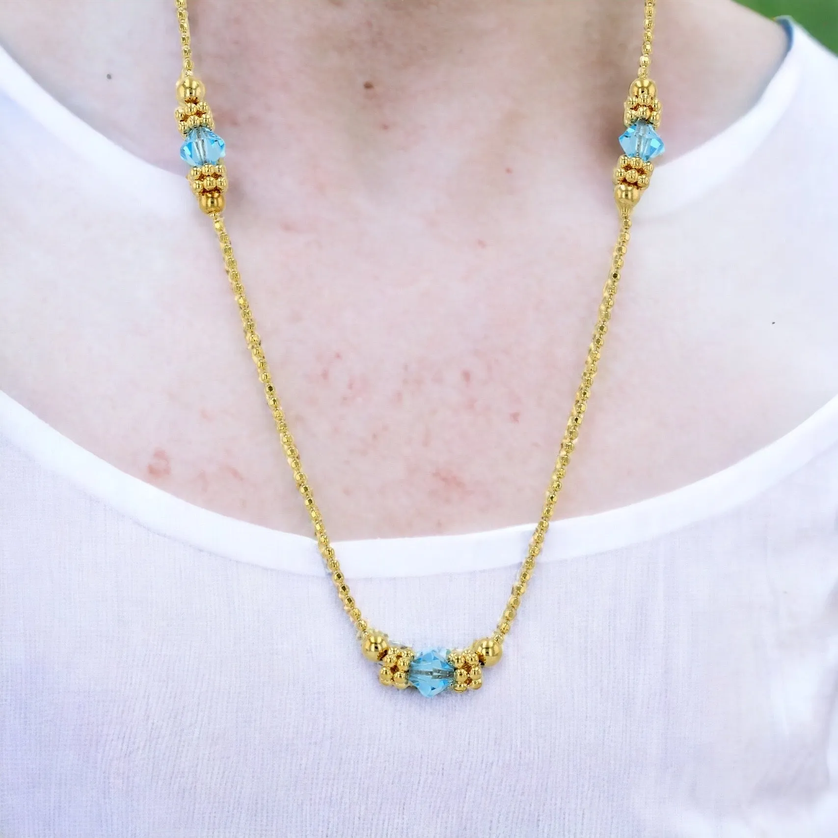 Yellow gold 14k blue topaz necklace